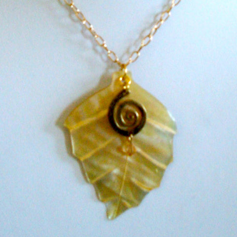 Gold Mother of Pearl leaf with charm